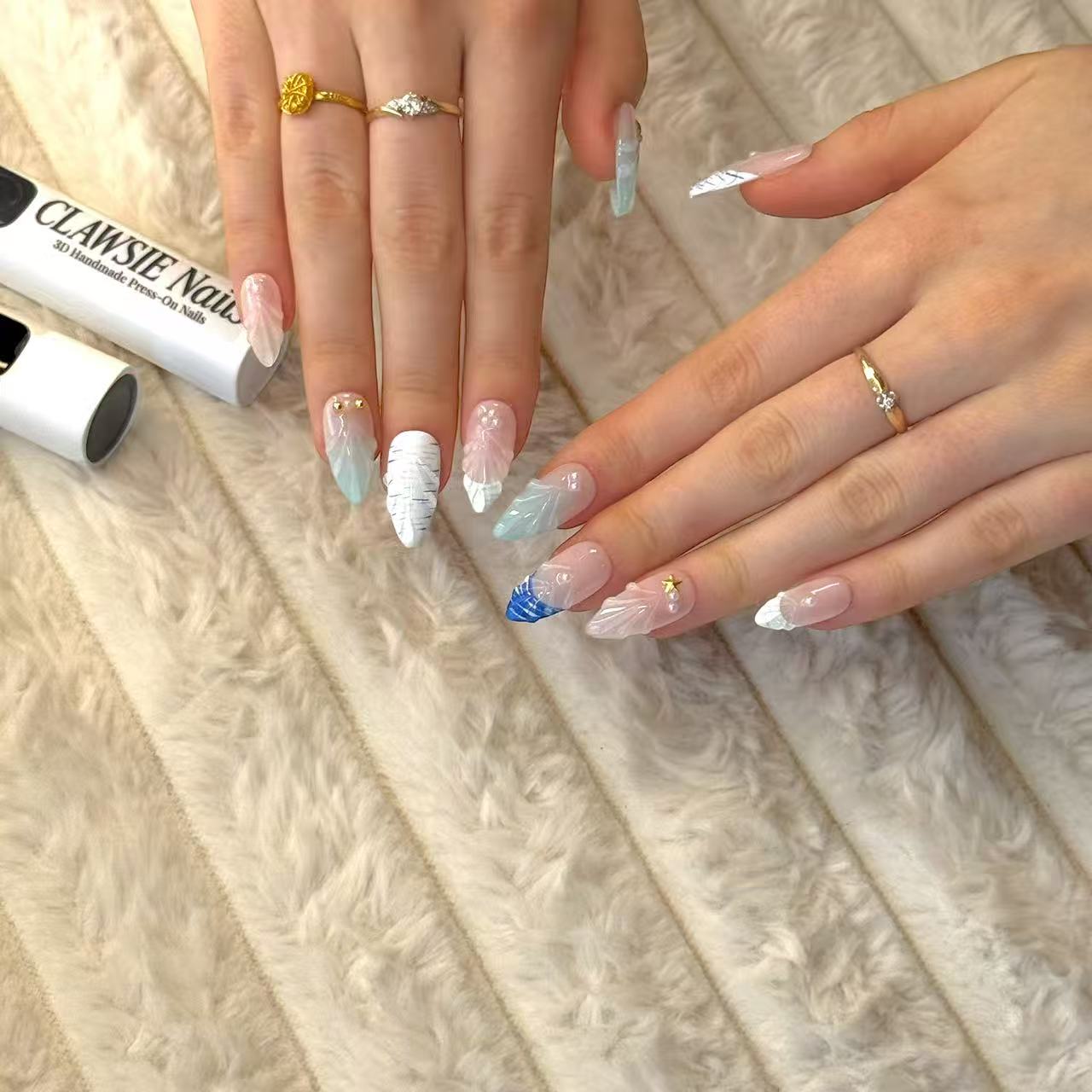 CLAWSIE Aqua medium almond nails – close-up handmade design, reusable press-on nails